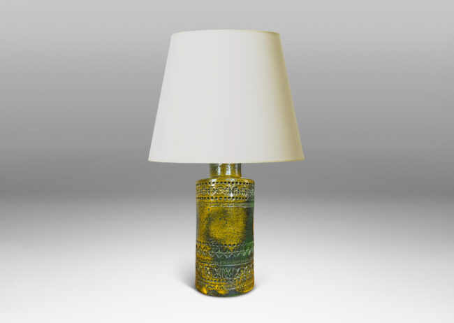 Gallery BAC medium height cylindrical form encircled in bands of impressed geometric ornaments, glazed in mustard yellow with green-gray