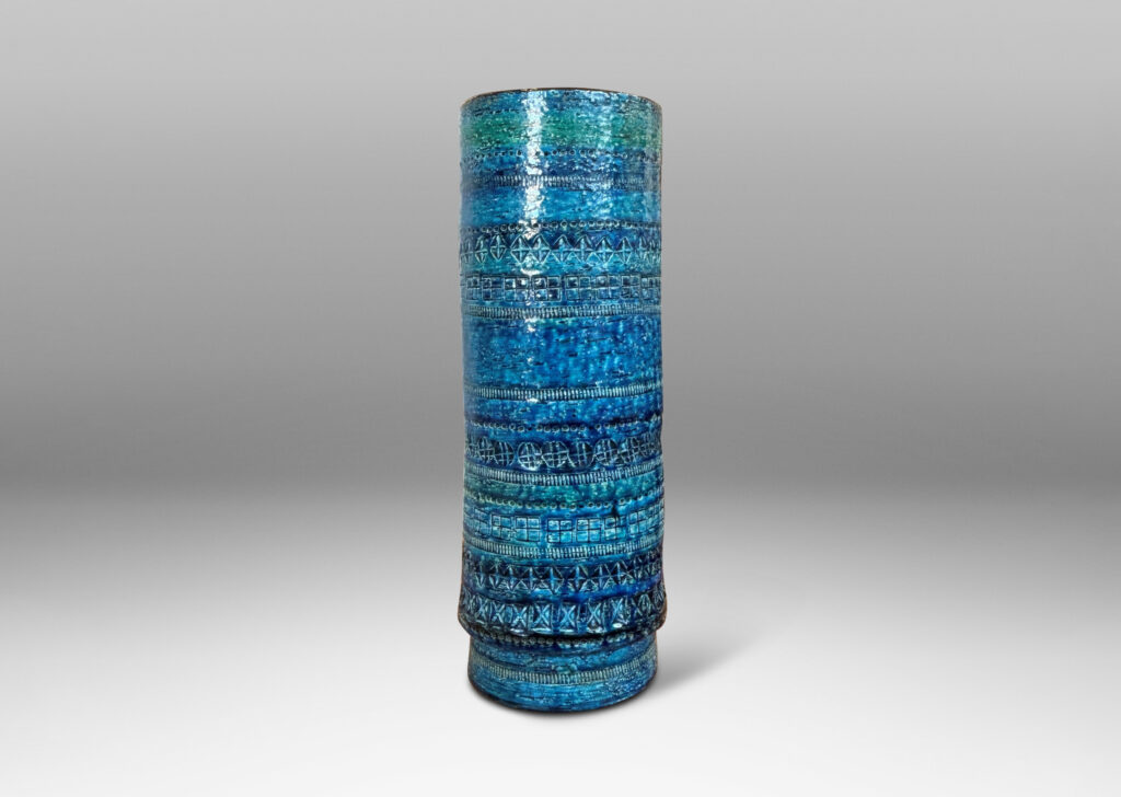 Gallery BAC all cylindrical form impressed ringed in bands of impressed ornamental motifs, glazed in bright cerulean tones