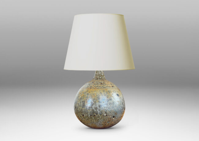 Gallery BAC blump globe form with carved rings on top and sprouting neck, glazed in pale taupe and gray