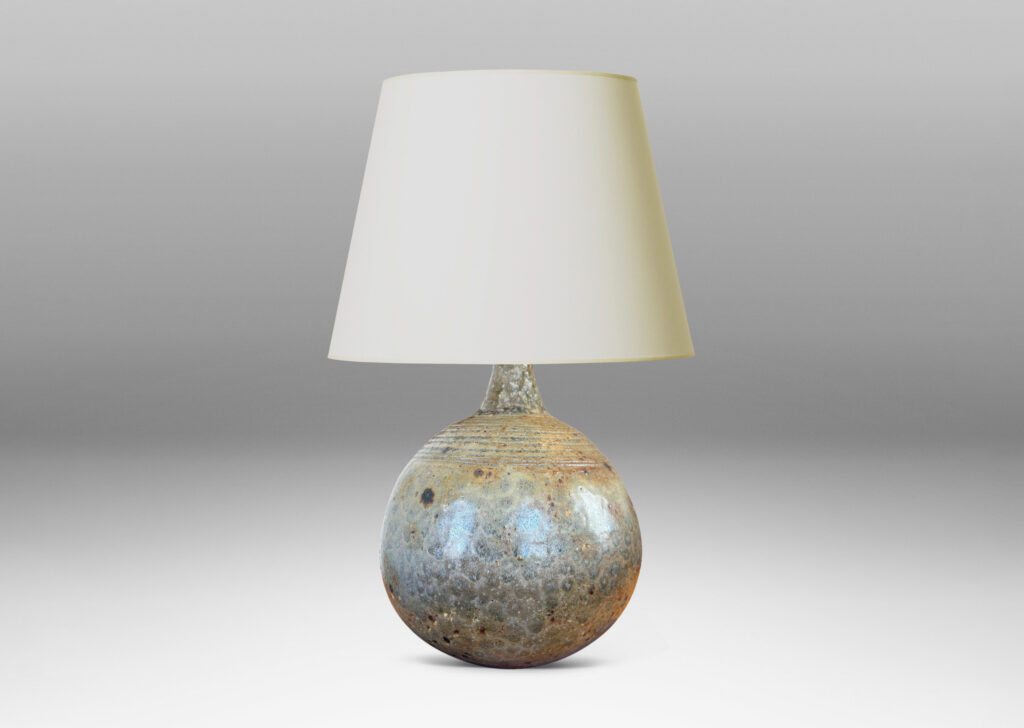 Gallery BAC blump globe form with carved rings on top and sprouting neck, glazed in pale taupe and gray