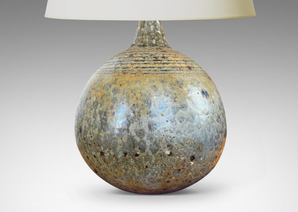 Gallery BAC blump globe form with carved rings on top and sprouting neck, glazed in pale taupe and gray