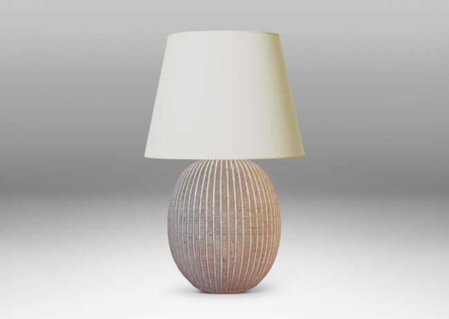 Gallery BAC light tan ovoid form with carved and white-glazed vertical pinstripes