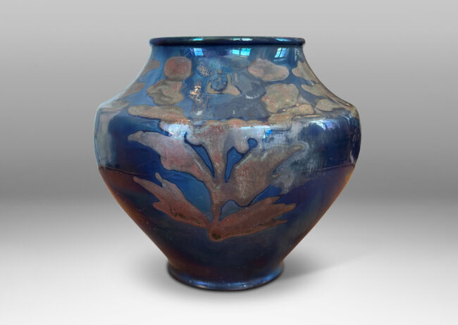 Gallery BAC wide tapered globe form with coved shoulders, glazed in blue-gray luster with red luster floral design