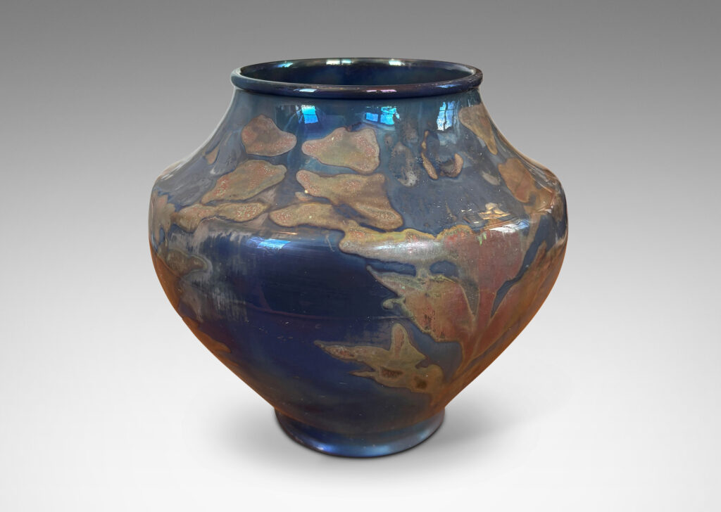 Gallery BAC wide tapered globe form with coved shoulders, glazed in blue-gray luster with red luster floral design
