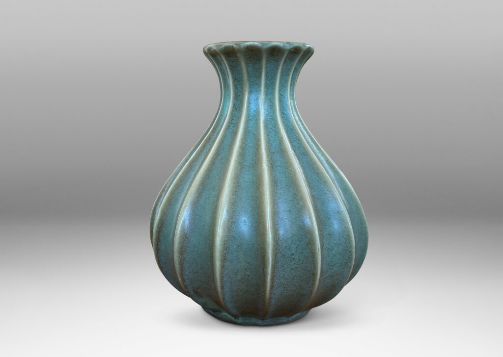 Gallery BAC fluted swelling form with outstretched mouth, in a turquoise-olive glaze