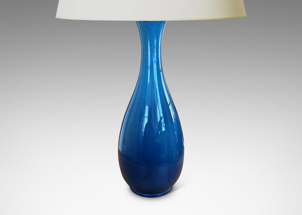 Gallery BAC slim sinuously modeled form glazed in a shiny savoy blue