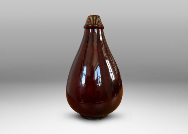 Gallery BAC eggplant-evoking drop form with ridged notch collar, glazed in a saturated burgundy oxblood
