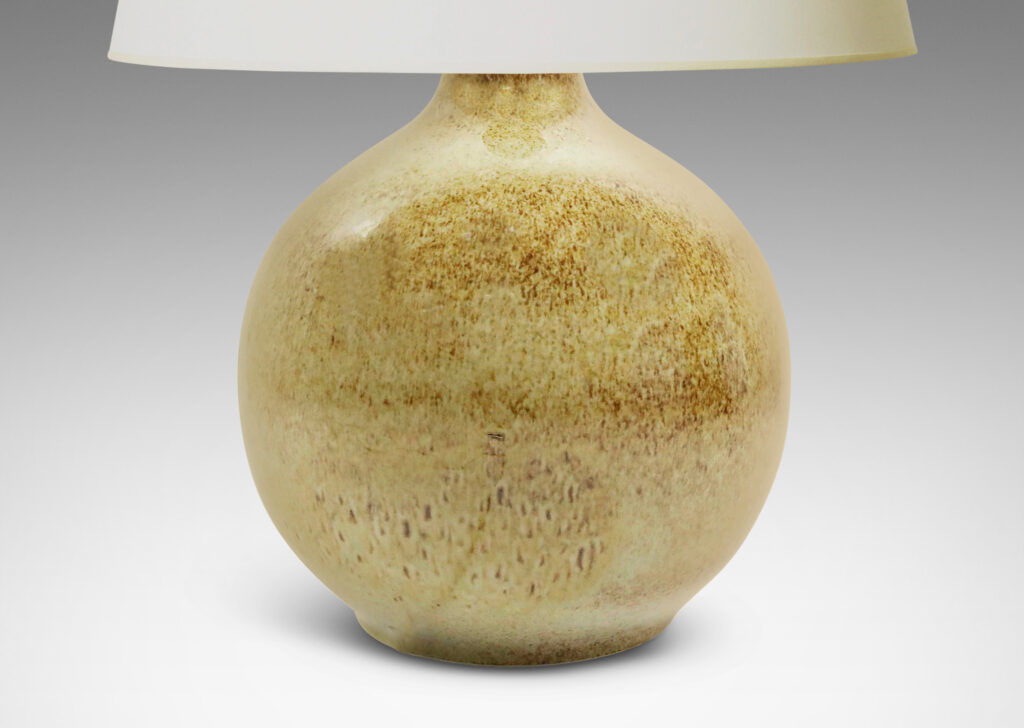 Gallery BAC globe form glazed in a beachy stipple dark over pale brown