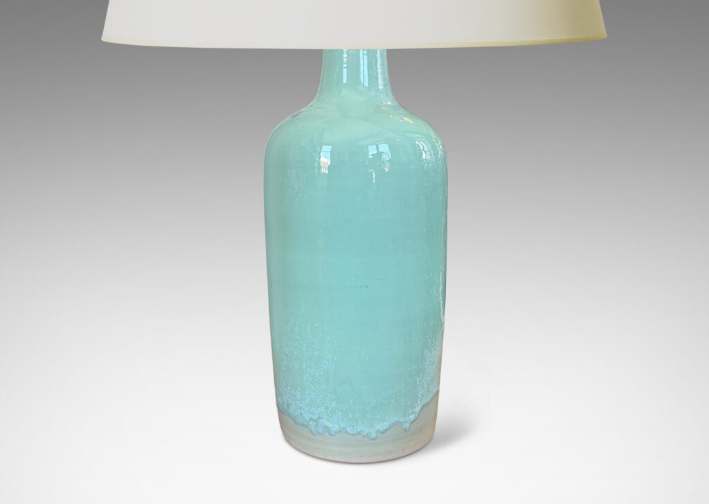 Gallery BAC tall tapered form glazed in a thick celadon tone with speckling and nice flow line at base