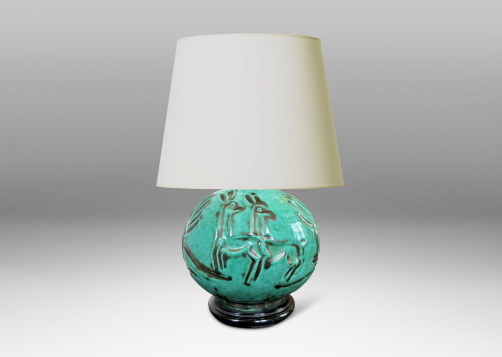 Gallery BAC plump globe form with carved countryside figures of animals, farmers and trees, in a tonal teal copper oxide glaze