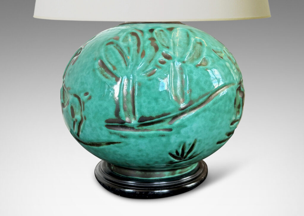 Gallery BAC plump globe form with carved countryside figures of animals, farmers and trees, in a tonal teal copper oxide glaze