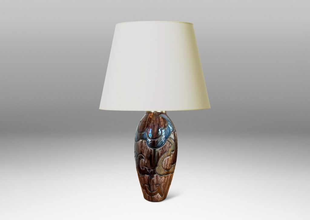 Gallery BAC carved design of scalloped forms, glazed in dark brown, blue and light raw umber