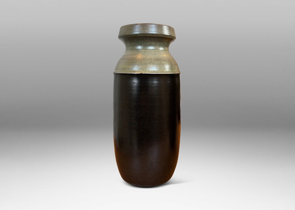 Gallery BAC cylindrical form with rounded corners and notched mouths, glazed in dark brown and gray