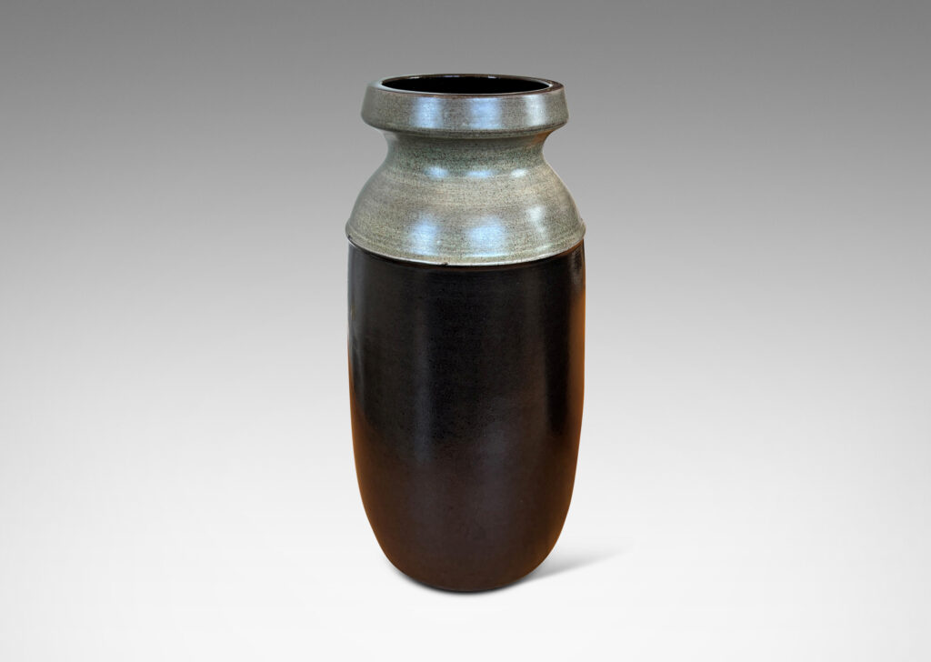 Gallery BAC cylindrical form with rounded corners and notched mouths, glazed in dark brown and gray