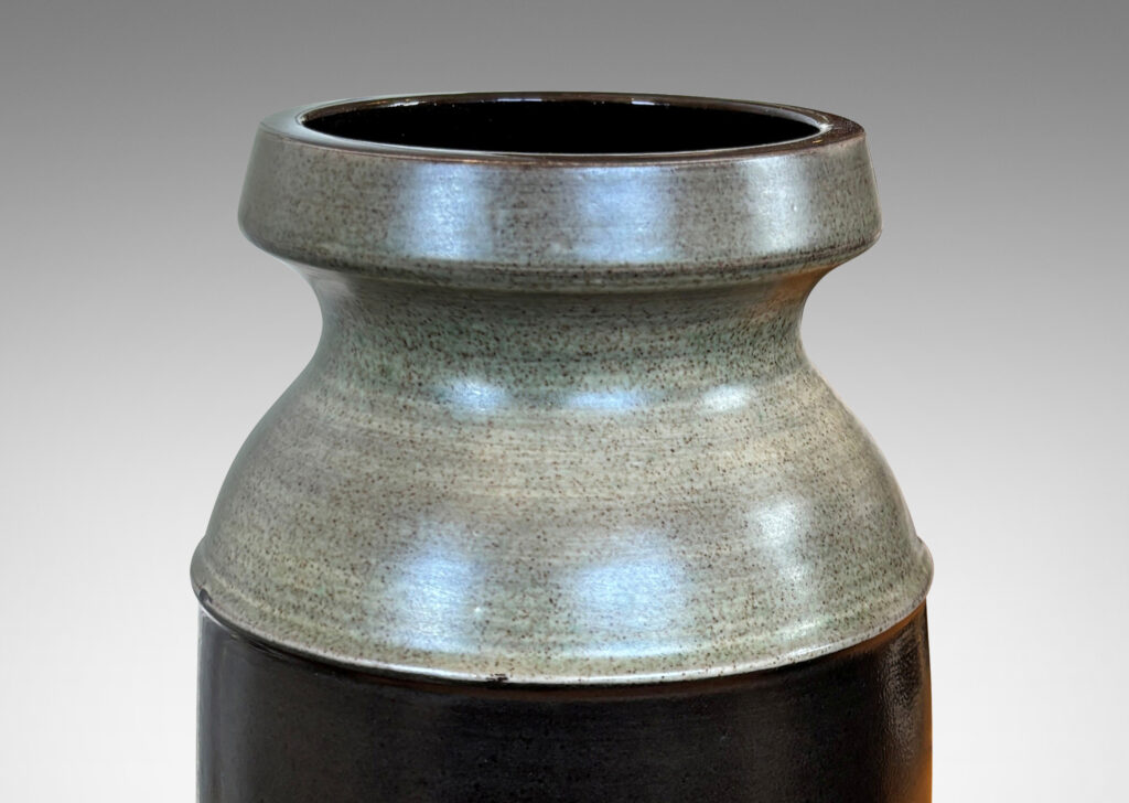 Gallery BAC cylindrical form with rounded corners and notched mouths, glazed in dark brown and gray