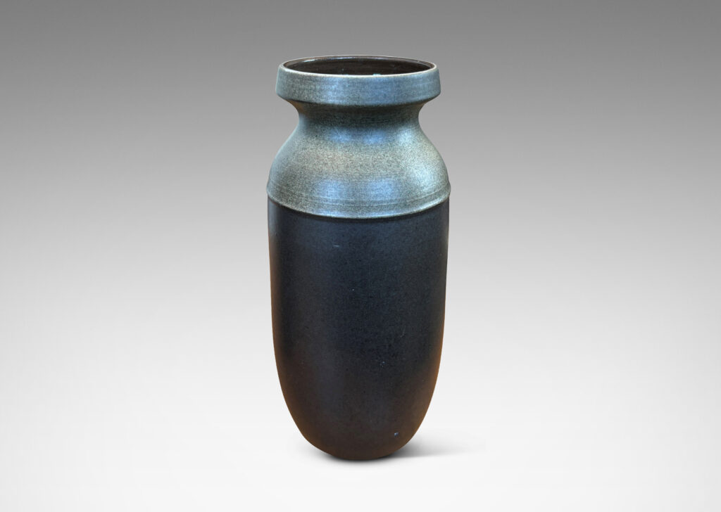 Gallery BAC cylindrical form with rounded corners and notched mouths, glazed in dark brown and gray
