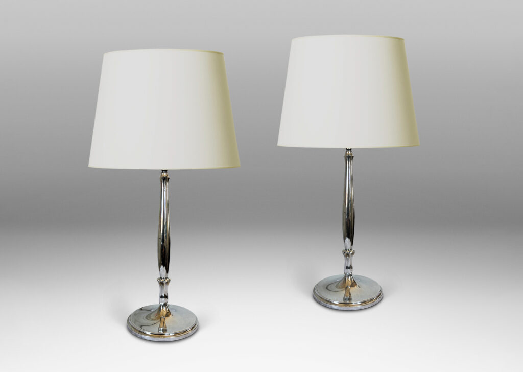 Gallery BAC sinuous swelling stands sprouting from abstracted tulip forms, mounted on disk stepped base; silver plate