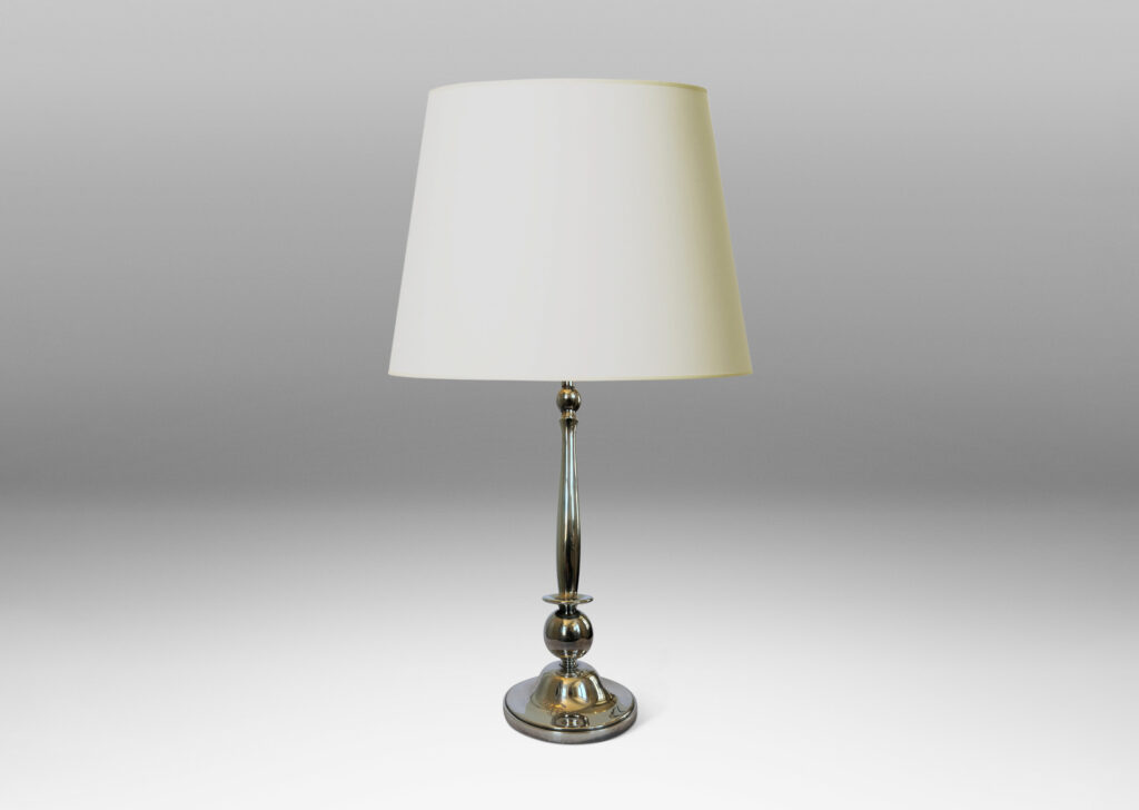 Gallery BAC sinuous swelling stand sprouting from a cuff atop an orb and disk base; silver plate