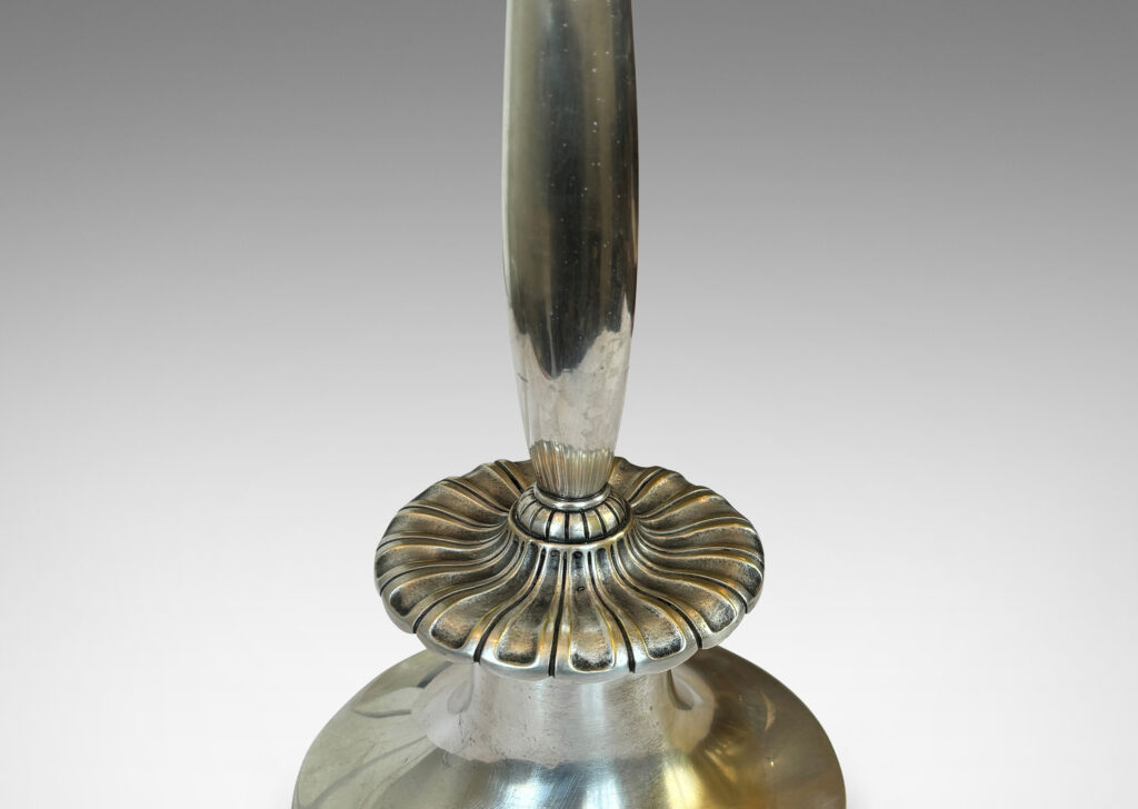 Gallery BAC swelling stand, with a large floating rosette fob and trumpet base; silver plate