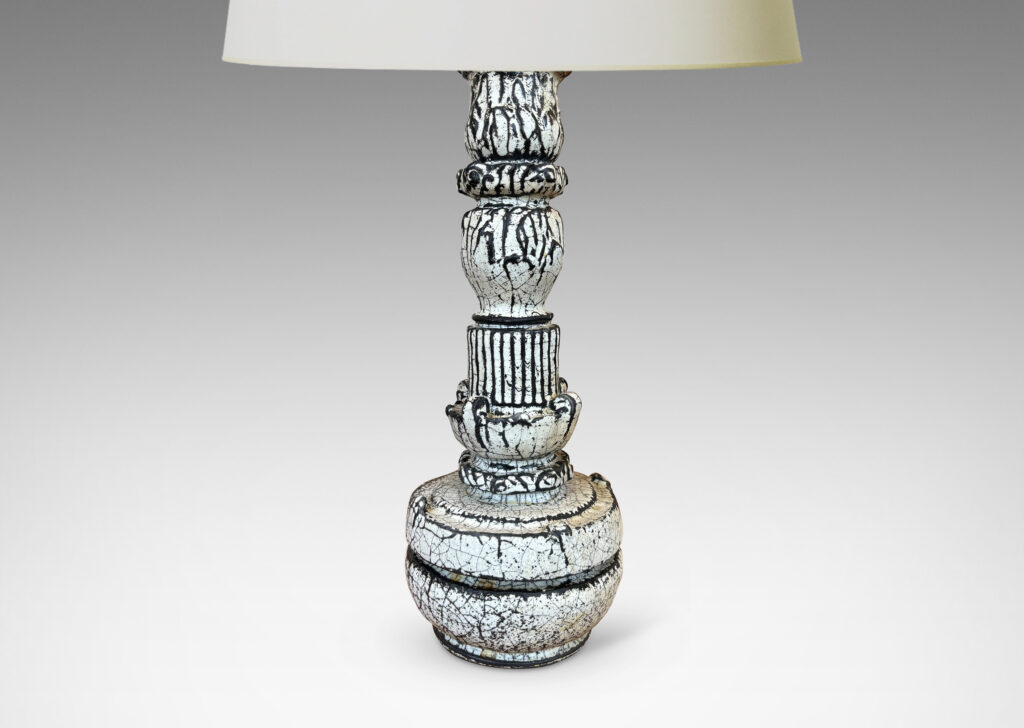 Gallery BAC tiered forms carved with balls of acanthus leave, bands of strikes and scrolling forms, wonderfully accentuated in a white-black tin glaze