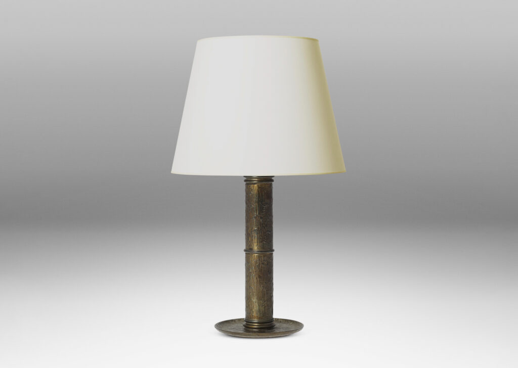 Gallery BAC thick stand with ring articulations and a dish base, with an overall painterly textural relief and lacquered finish