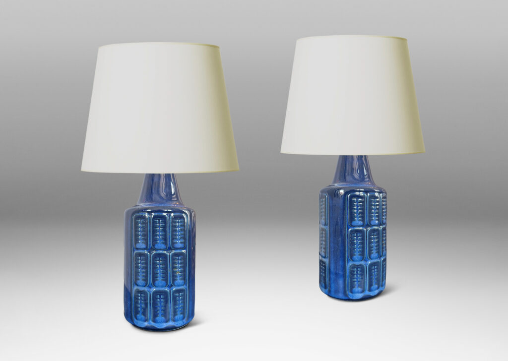 Gallery BAC cylindrical forms with relief grids of patterned ovoids, glazed in a tonal gray-blue