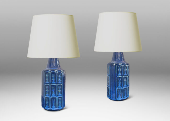 Gallery BAC cylindrical forms with relief grids of patterned ovoids, glazed in a tonal gray-blue