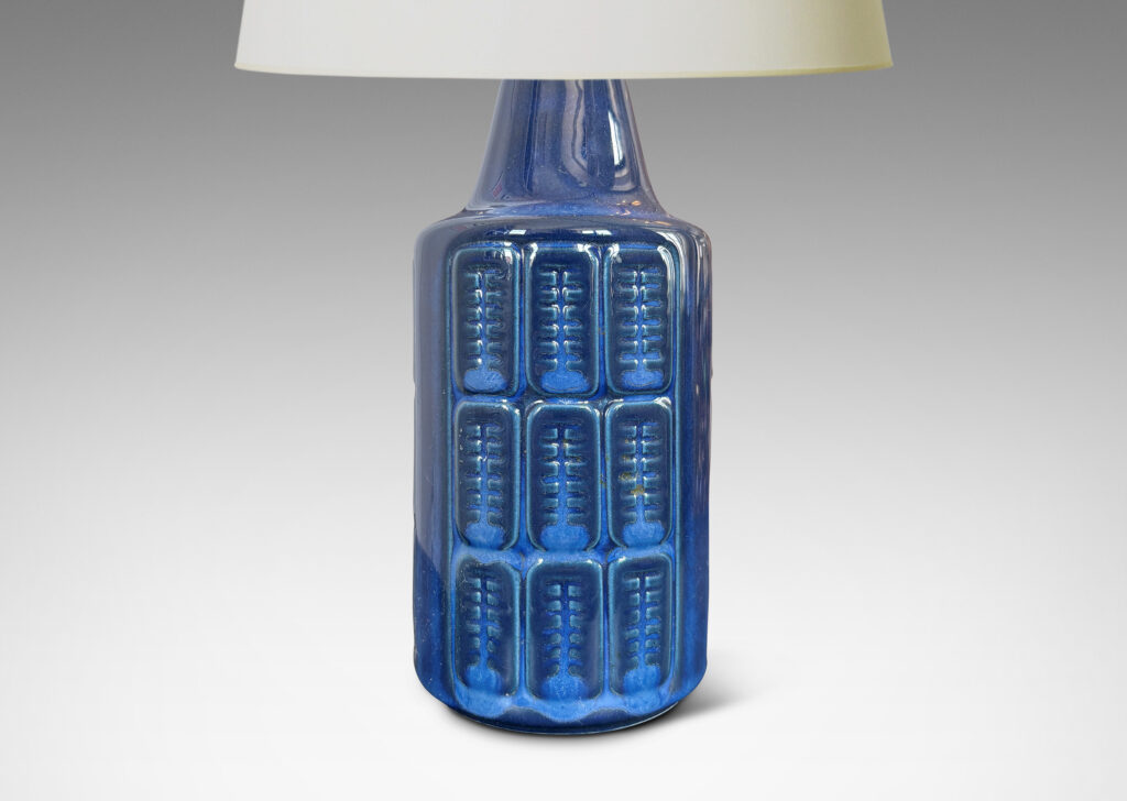 Gallery BAC cylindrical forms with relief grids of patterned ovoids, glazed in a tonal gray-blue