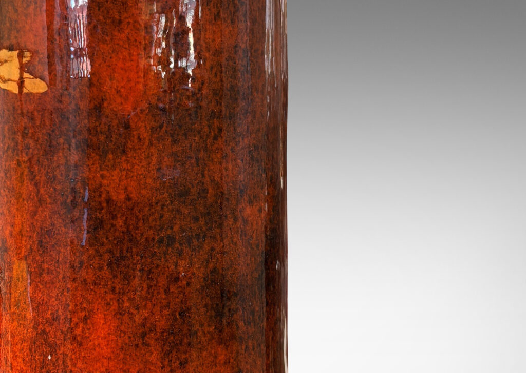 Gallery BAC tall clylindrica bottle form in a rich orange-brown glaze with matte