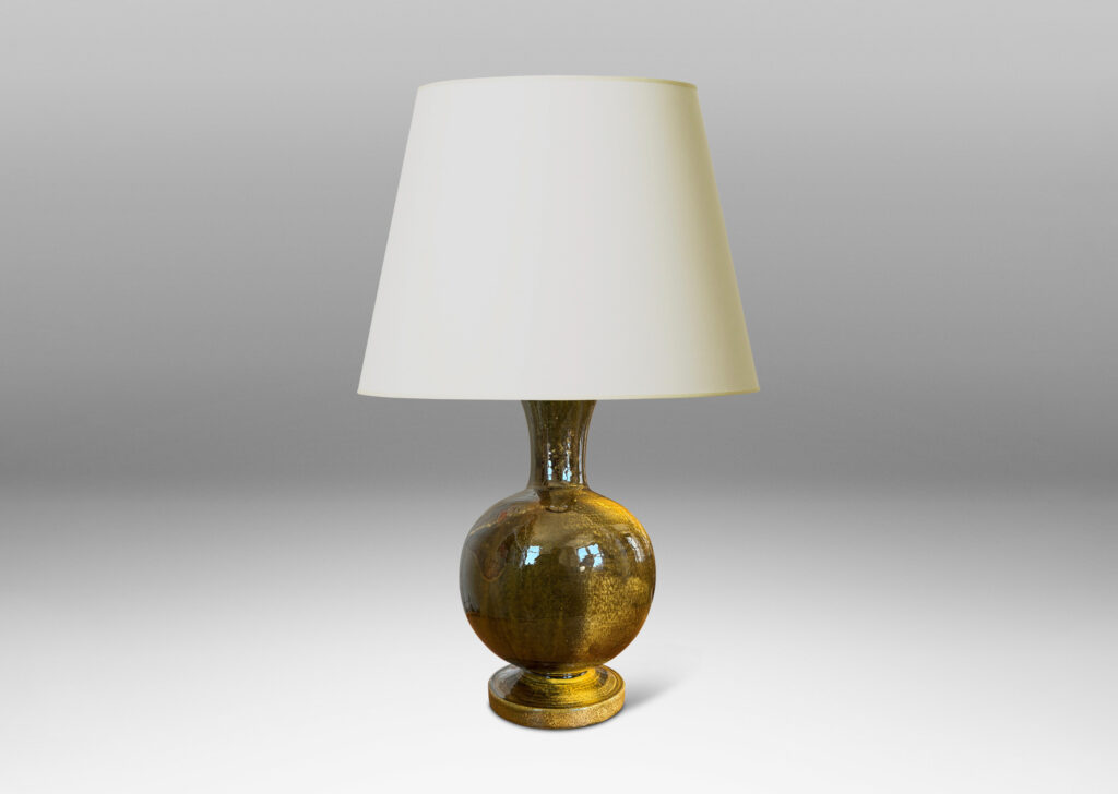 Gallery BAC rationalized baluster form, with spherical body, disk base and flared neck, glazed in yellow-black