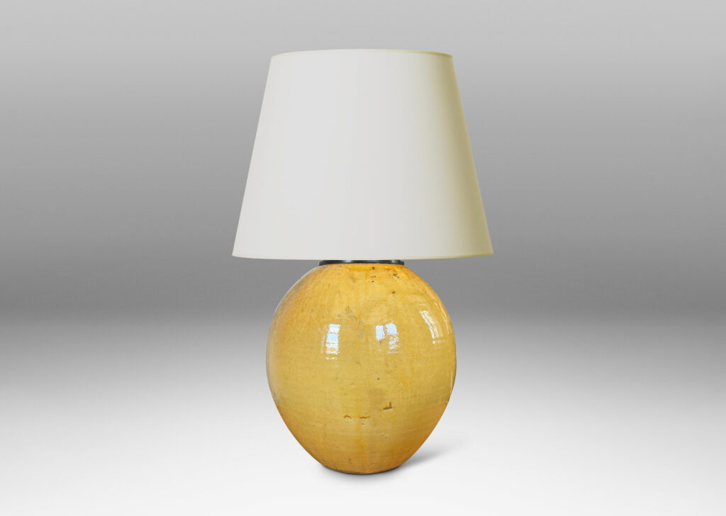 Gallery BAC plump spherical form, glazed in a gloss yellow with black stipple;