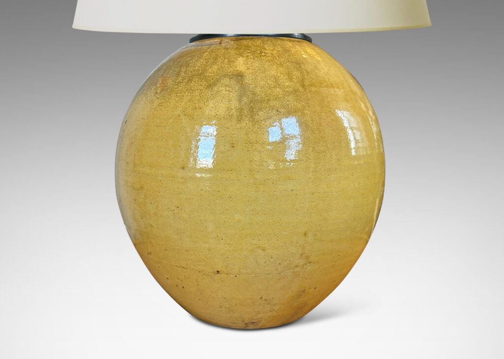 Gallery BAC plump spherical form, glazed in a gloss yellow with black stipple;