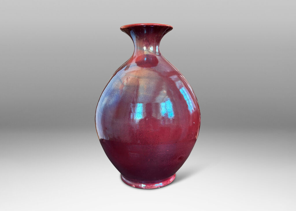 Gallery BAC ovoid form with outstretched mouth, glazed in the pottery’s famous red luster
