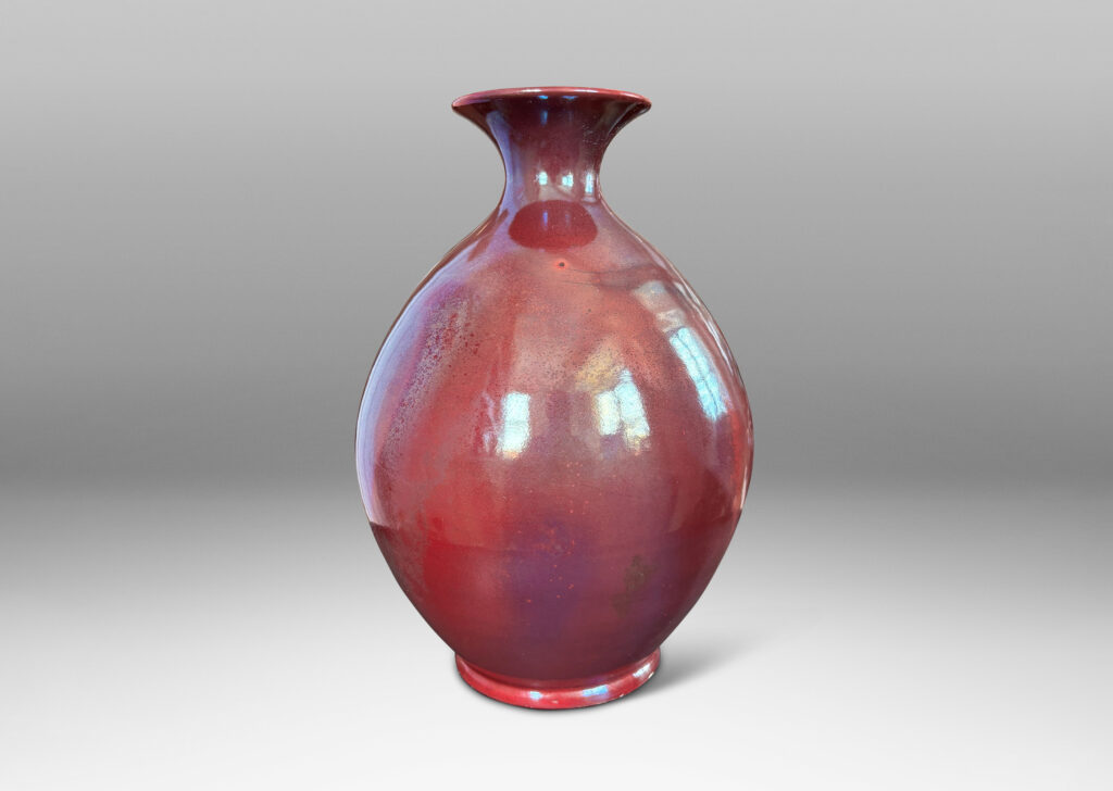 Gallery BAC ovoid form with outstretched mouth, glazed in the pottery’s famous red luster