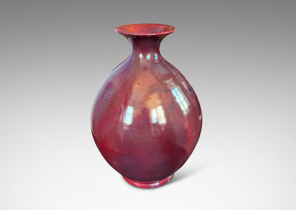Gallery BAC ovoid form with outstretched mouth, glazed in the pottery’s famous red luster
