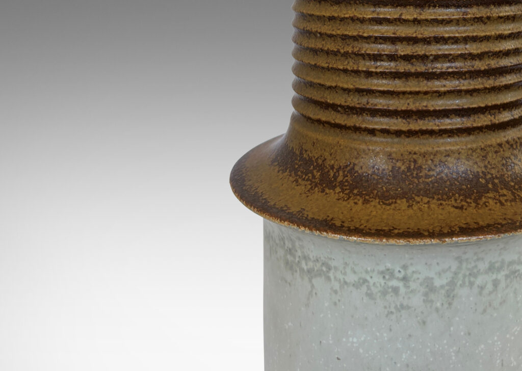 Gallery BAC iered form with ridged upper section, glazed in dappled brown and pale gray