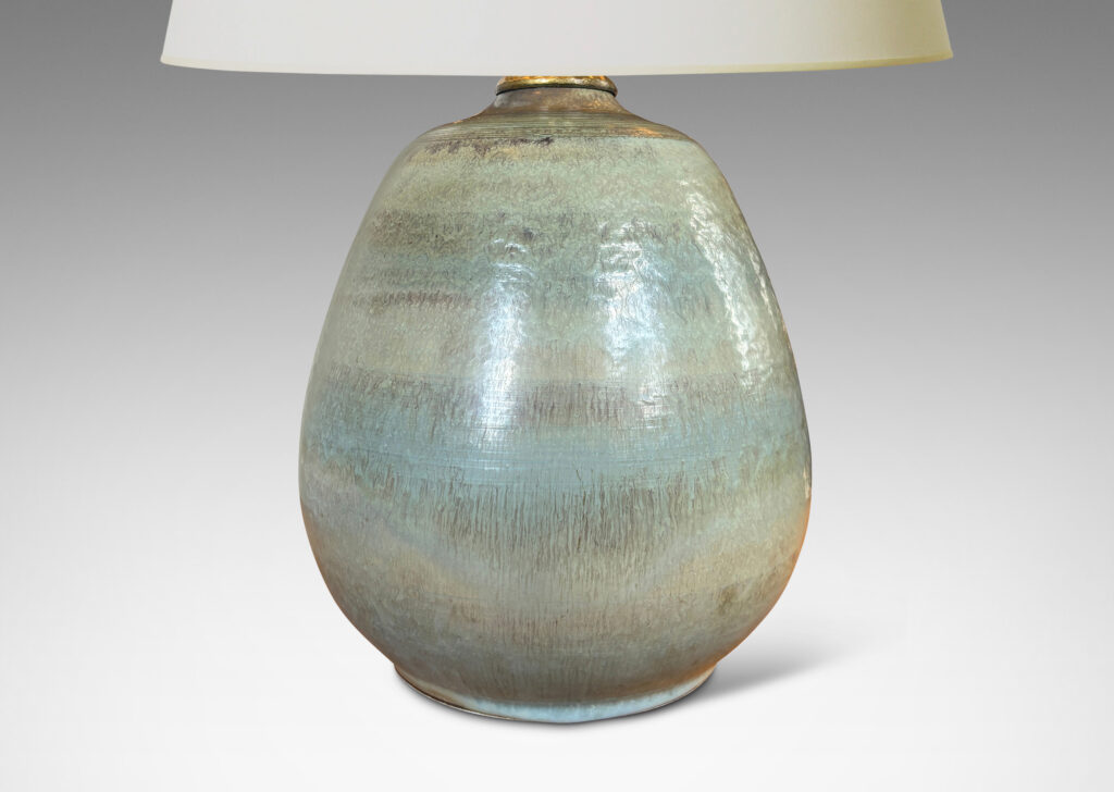 Gallery BAC ovoid form topped with carved spiraling pinstripes, and glazed in subtle bands of green-gray and blue-gray