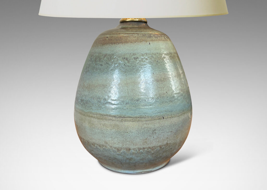 Gallery BAC ovoid form topped with carved spiraling pinstripes, and glazed in subtle bands of green-gray and blue-gray