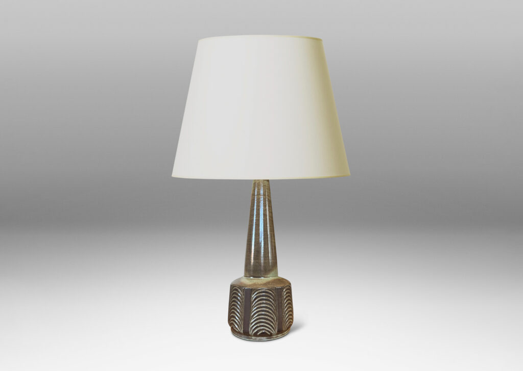 Gallery BAC drum form with carved panels of arc motifs and tall conical stand, glazed in an eggshell finish brown-taupe, with matte brown accents