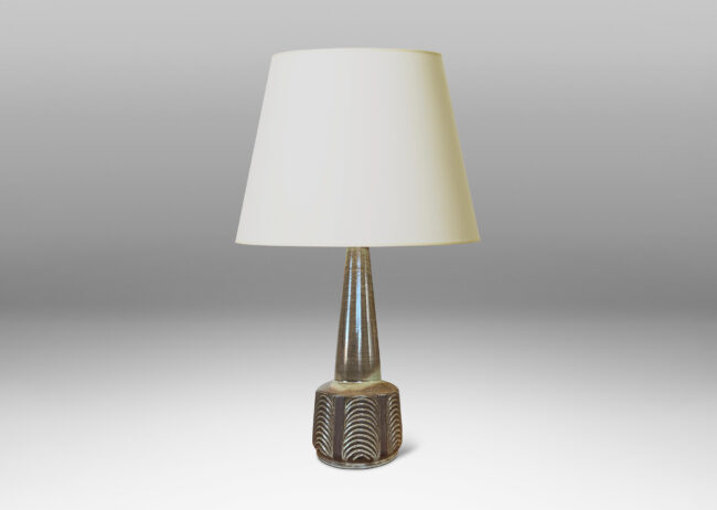 Gallery BAC drum form with carved panels of arc motifs and tall conical stand, glazed in an eggshell finish brown-taupe, with matte brown accents
