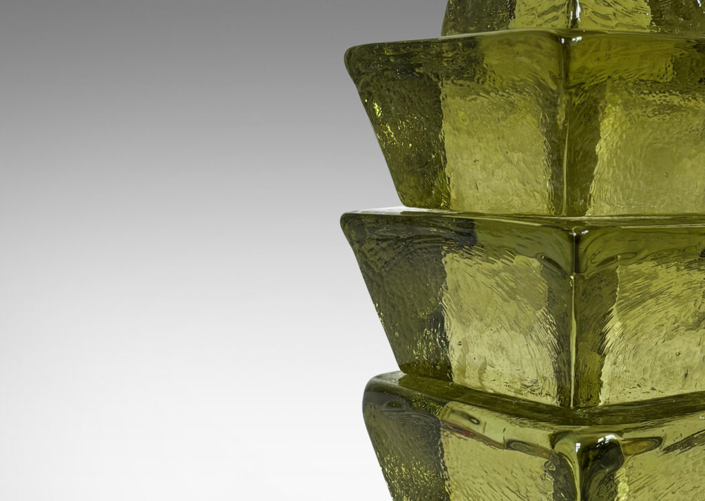 Gallery BAC textured stacked square chamfered forms in a pale bottle green; glass