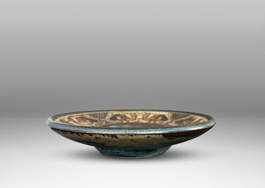 Gallery BAC wide rim ornamented with emu-like bird forms, finished in a handsomely rendered beige and brown “Sung” glaze