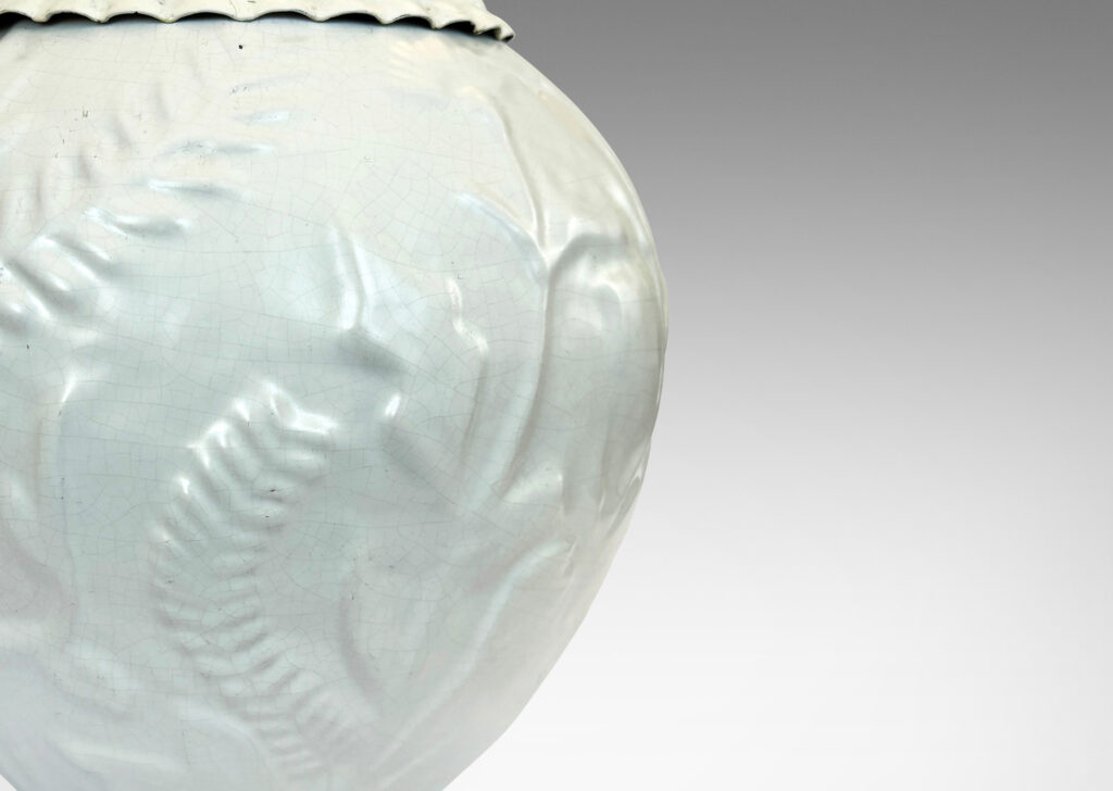 Gallery BAC tapered form with cast wildflower design in white glaze and embossed mount painted to match