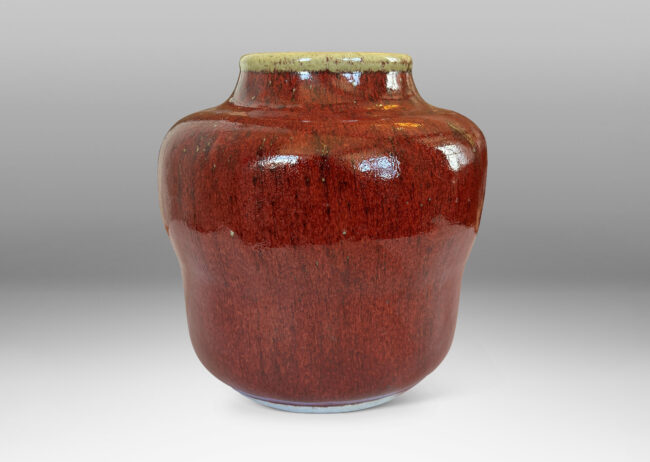 Gallery BAC swelling gourd form with wide mouth, glazed in a deep burgundy oxblood with pale gray accents