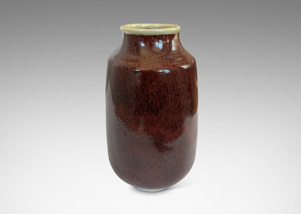 Gallery BAC large ovoid form with straight, upwardly-tapered sides and wide mouth, glazed in a deep burgundy oxblood with pale gray accents