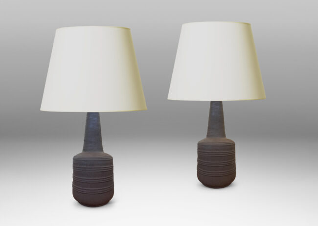 Gallery BAC drum forms with decorative ridge bands and tall conical necks in matte brown
