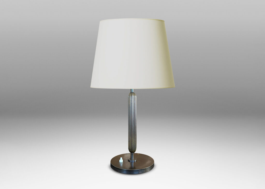 Gallery BAC reeded floating stand, with reveals above and below, and disk base, patinated in an antique bronze