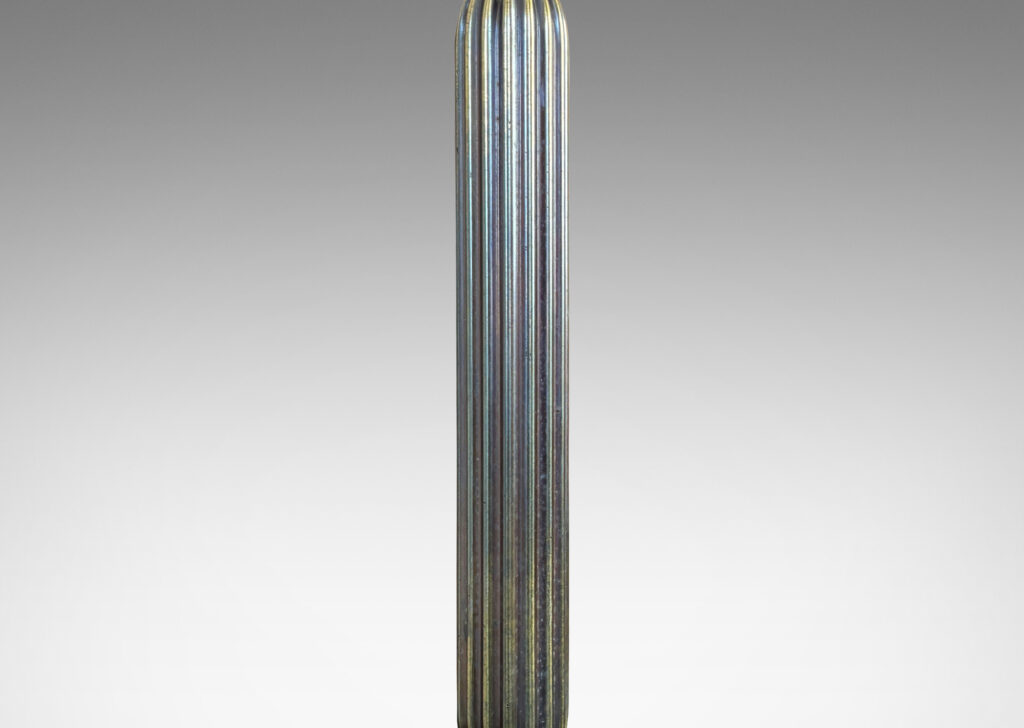 Gallery BAC reeded floating stand, with reveals above and below, and disk base, patinated in an antique bronze