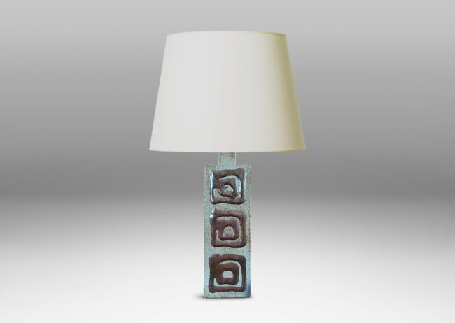 Gallery BAC two floating rectangular planes connected by a central pillar, glazed in dappled gray-brown with concentric square motifs in red luster