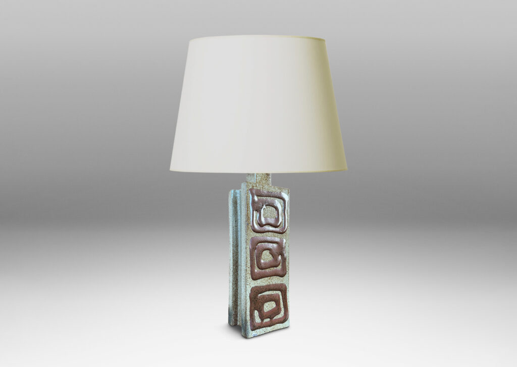 Gallery BAC two floating rectangular planes connected by a central pillar, glazed in dappled gray-brown with concentric square motifs in red luster